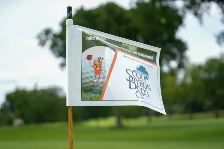 Sponsor pin flag at a charity golf tournament