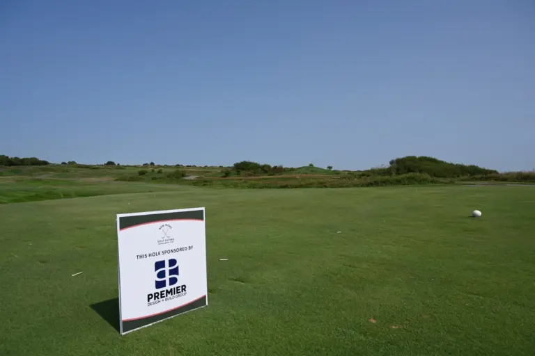 Tee sign at a charity golf tournament