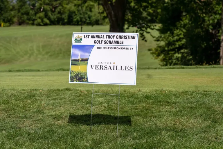 Tee sign at a charity golf tournament